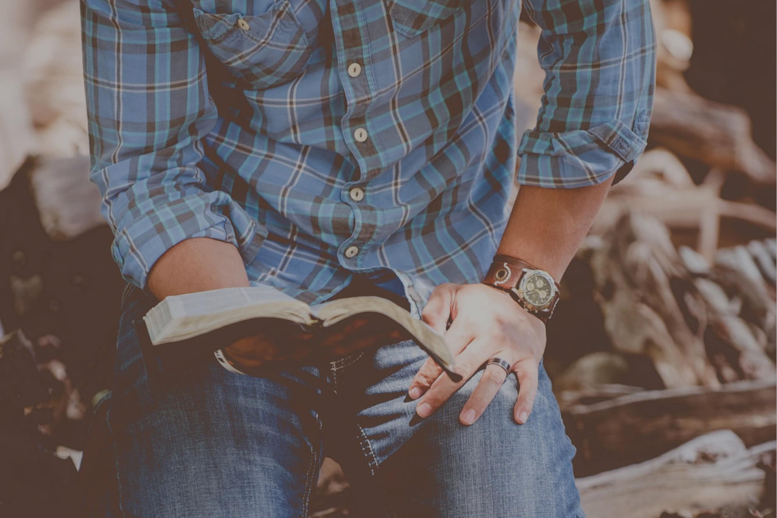 Man-Kneeling-Reading-Bible-3_2-MHATC-Site-Header-comp